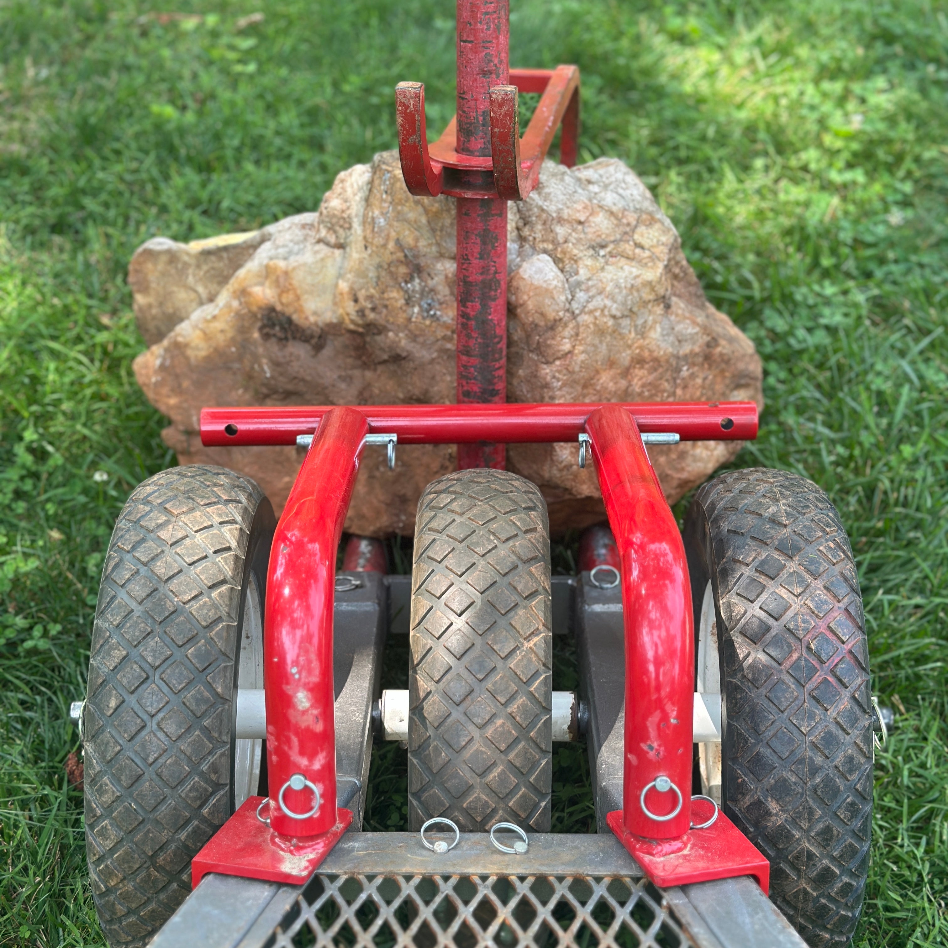 Rock Hauler loaded with rock and third wheel