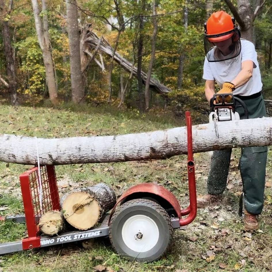 Log hauler configuration Rhino Tool Systems landscapers cart used as chainsaw support