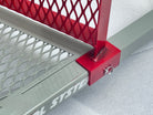 Metal support brace pinned into metal tubing