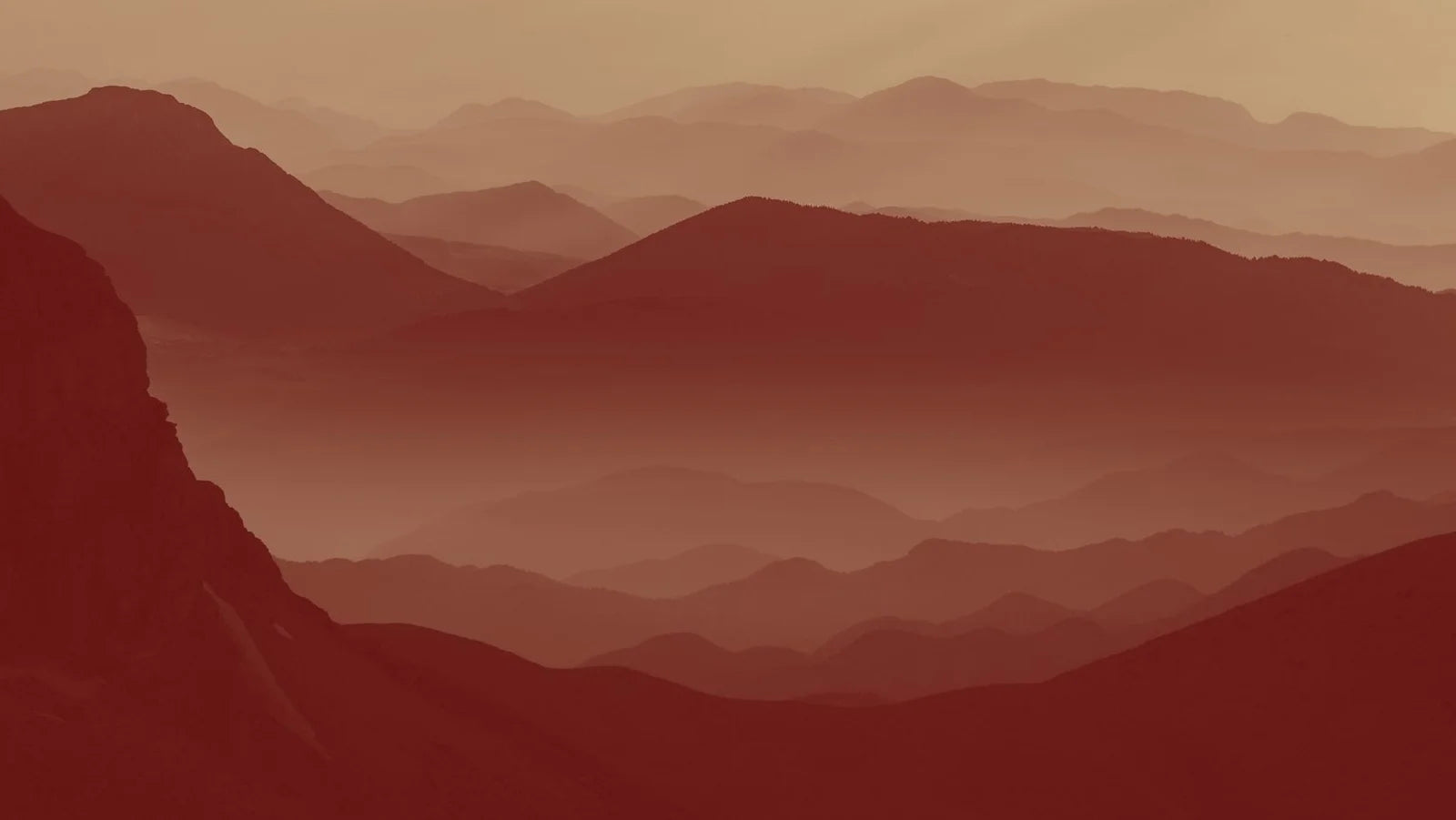 red mountains with fog