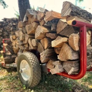 Rhino Tool Systems landscapers cart in the lumber hauler configuration with extensions hauling a large load of firewood