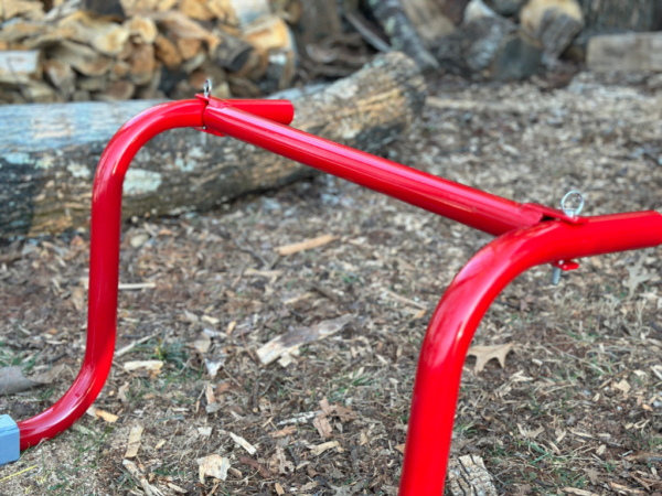 Handle connector bar attached to two handles of the Rhino Tool Systems landscapers cart